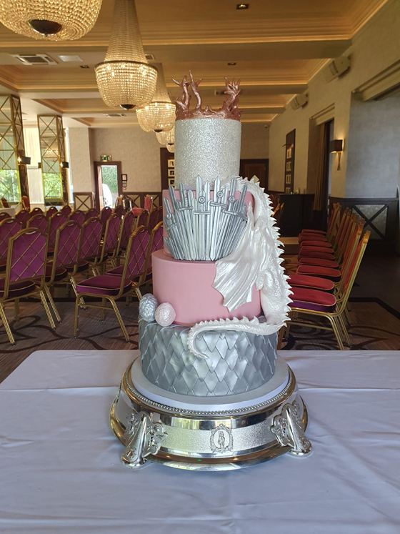 Game of Thrones inspired silver and pink cake with white dragon